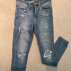 Levi 721 high rise skinny ripped jeans